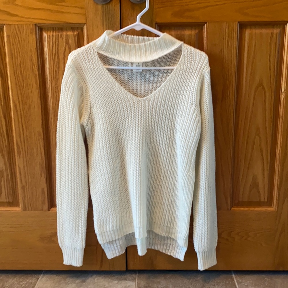 Cream V-neck cut out neck….high low bottom